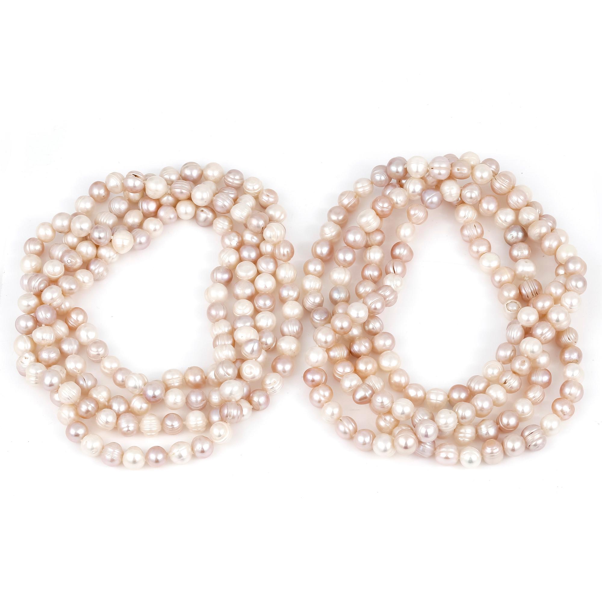 COLLIER, 2 st, odlade vita och rosa sötvattenpärlor.