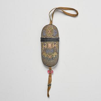 A set of three embroidered purses/ eye-glass cases, Qing dynasty, 19th century.