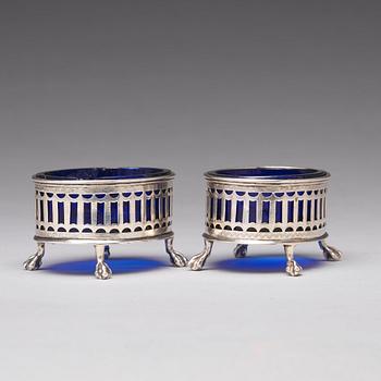 A pair of Swedish 18th century silver and blue glass salt cellars, mark of Pehr Zethelius, Stockholm 1791.