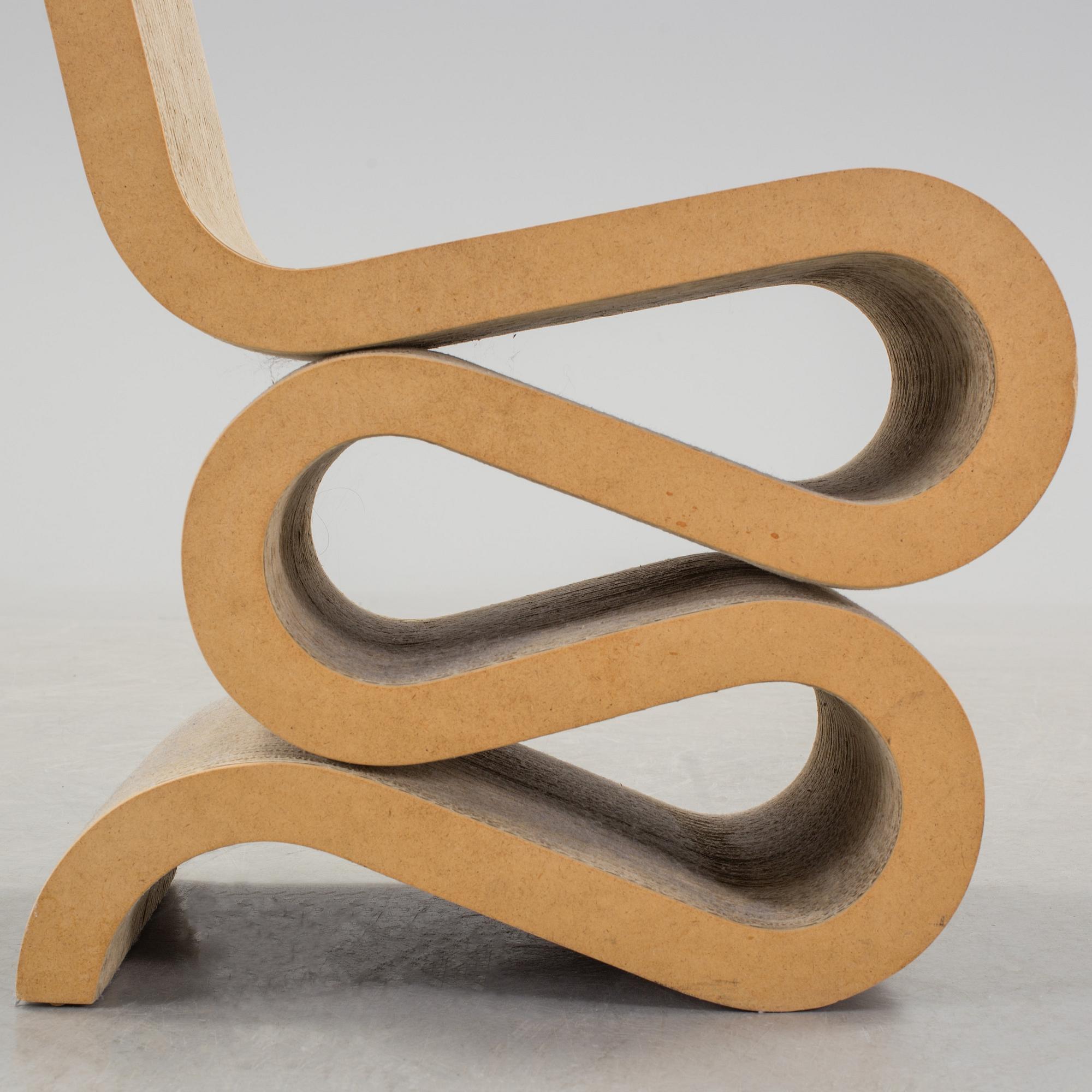 A 21 th century Frank O. Gehry "Wiggle Side Chair" for Vitra, Germany.