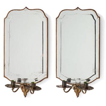 67. A pair of Late Baroque two-light girandole mirrors.