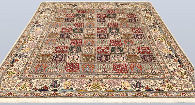 A part silk Moud rug, approx. 250 x 199 cm.