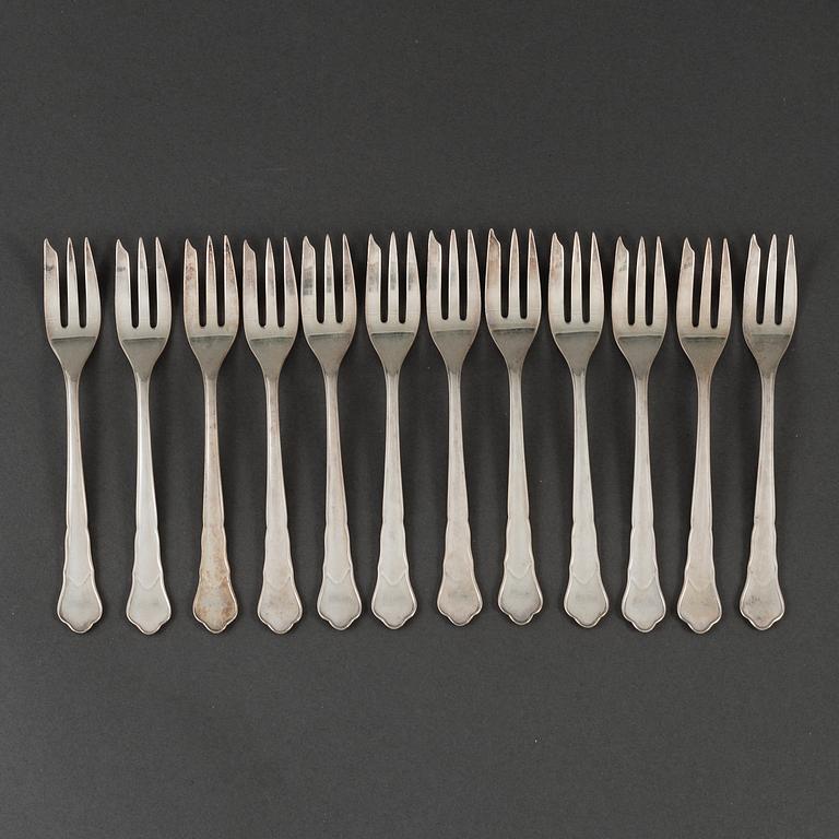 Tweleve silver cake forks, mid 20th century.