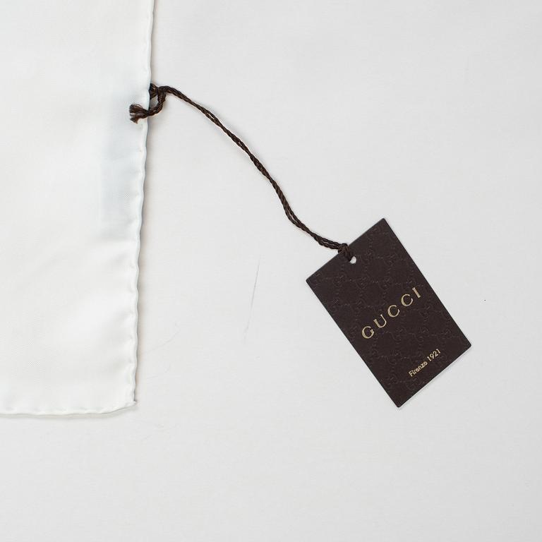 Gucci, a twill silk scarf.