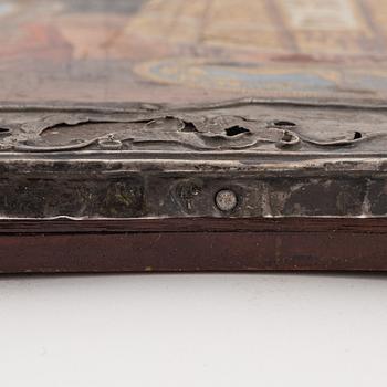 A silver and tempera on wood icon, Moscow 1776.