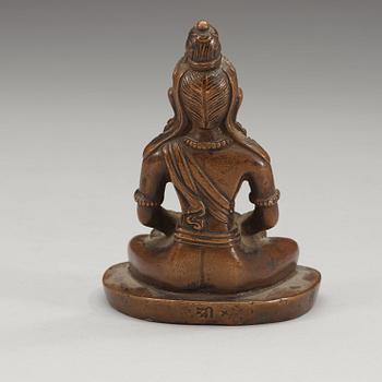 A copper alloy figure of Amitayus, Tibet/Nepal, presumably late 19th century/early 20th century.