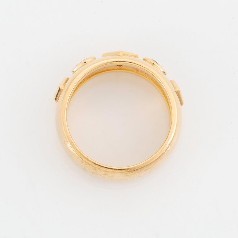 Cartier ring 18K guld med trappslipade diamanter och fasettslipade safirer.