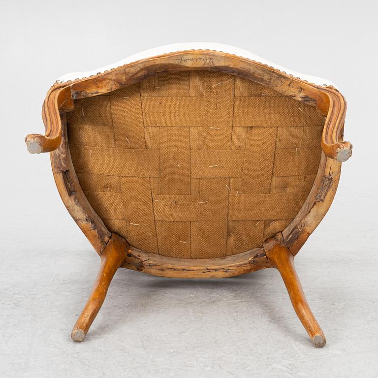 A French Louis XV oåpen back armchair, mid 18th century.