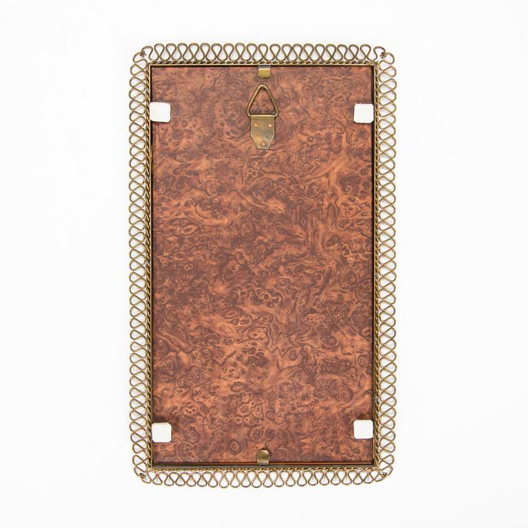 A mid-20th-century Swedish Modern mirror.