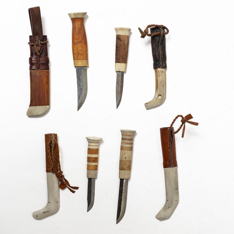 Eight knives, of which seven are half-horn knives, signed.