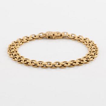 Armlänk, "x-länk", 18K guld. Bolidenguld.