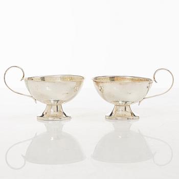 Twelve silver mugs, K&EC, Gothenburg, 1949-62.