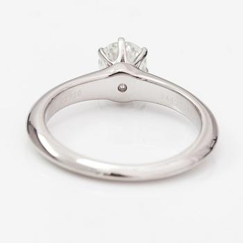 Tiffany & Co, A platinum ring with a ca. 0.55 ct diamond.