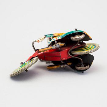 A tinplate Technofix bicycling clown Germany c. 1950.