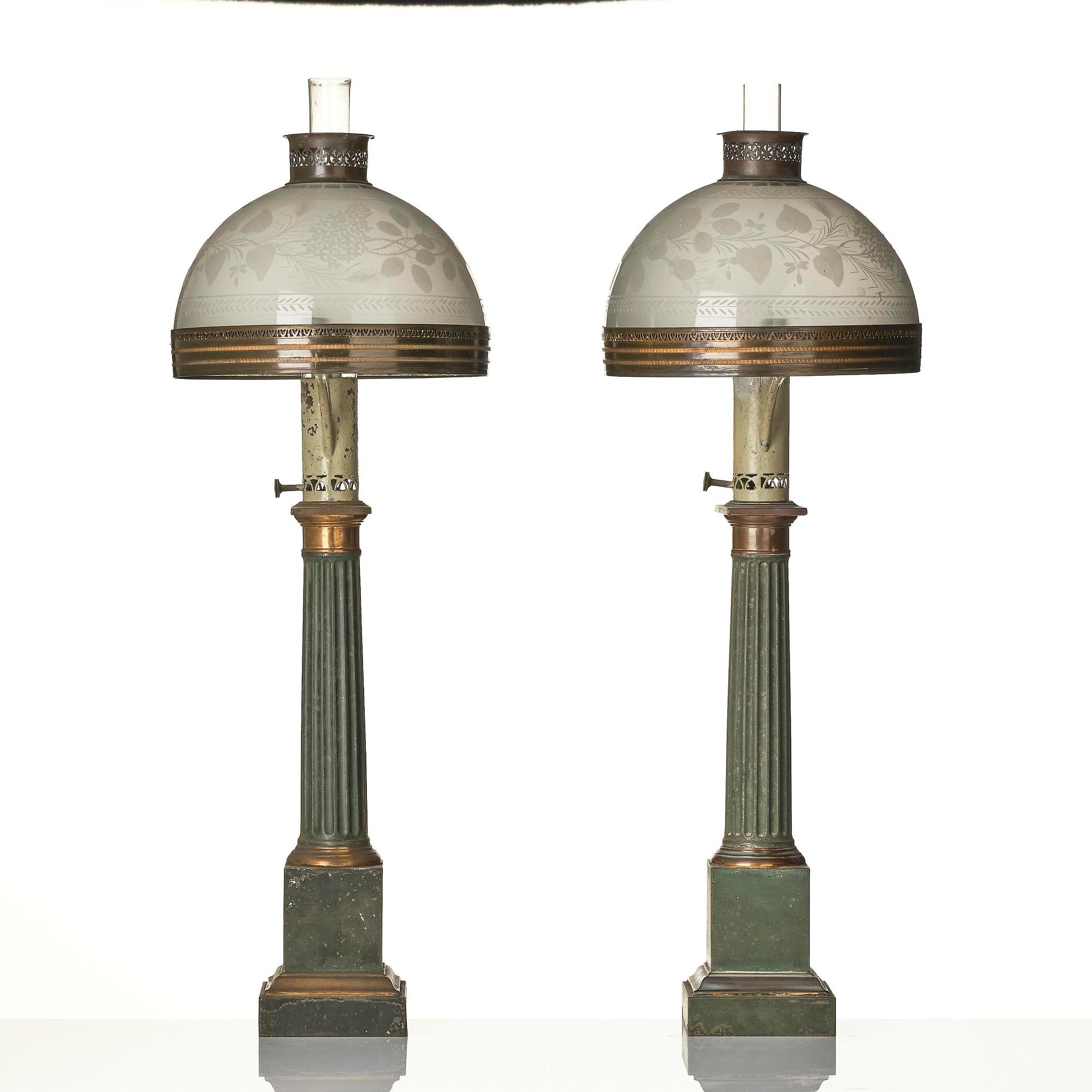 A pair of Empire painted sheet metal carcel oil lamps.