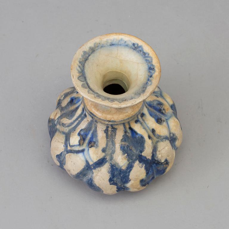 A 13th century persian pottery vase.