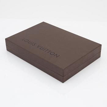 Louis Vuitton, a monogram "Trousse kit de voyage' travel kit with inflatible pillow and eye mask.