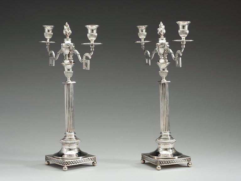 A pair of Swedish 18th century silver candleabra, makers mark of Mattias Engman, Stockholm 1796.