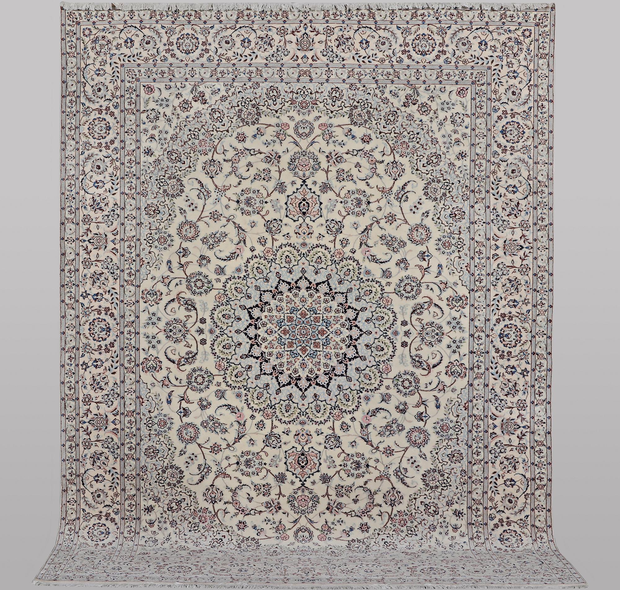 A carpet, Nain, part silk, ca 341 x 245 cm.