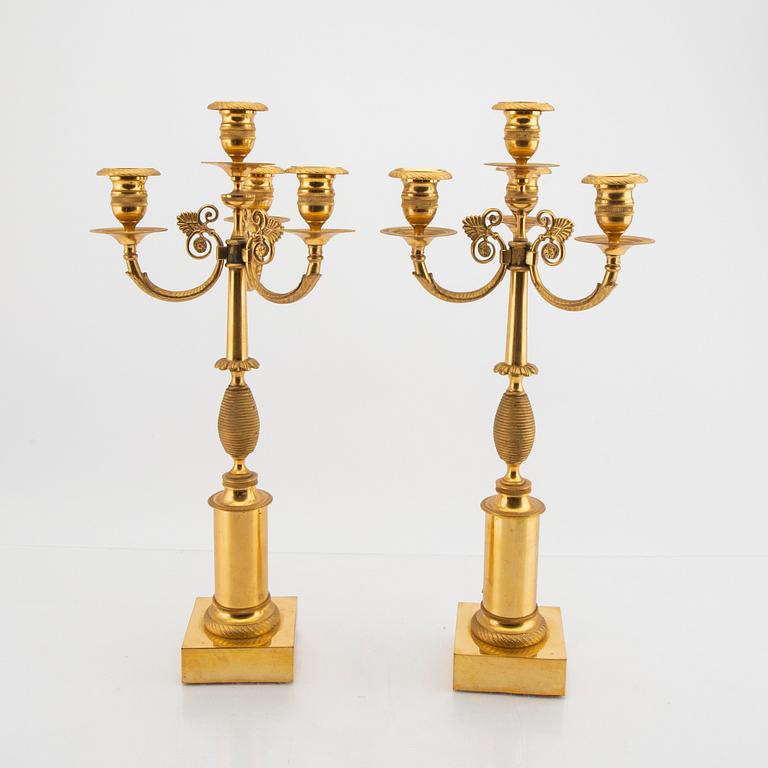 A pair of Empire style candelabras first half of the 20tyh century.