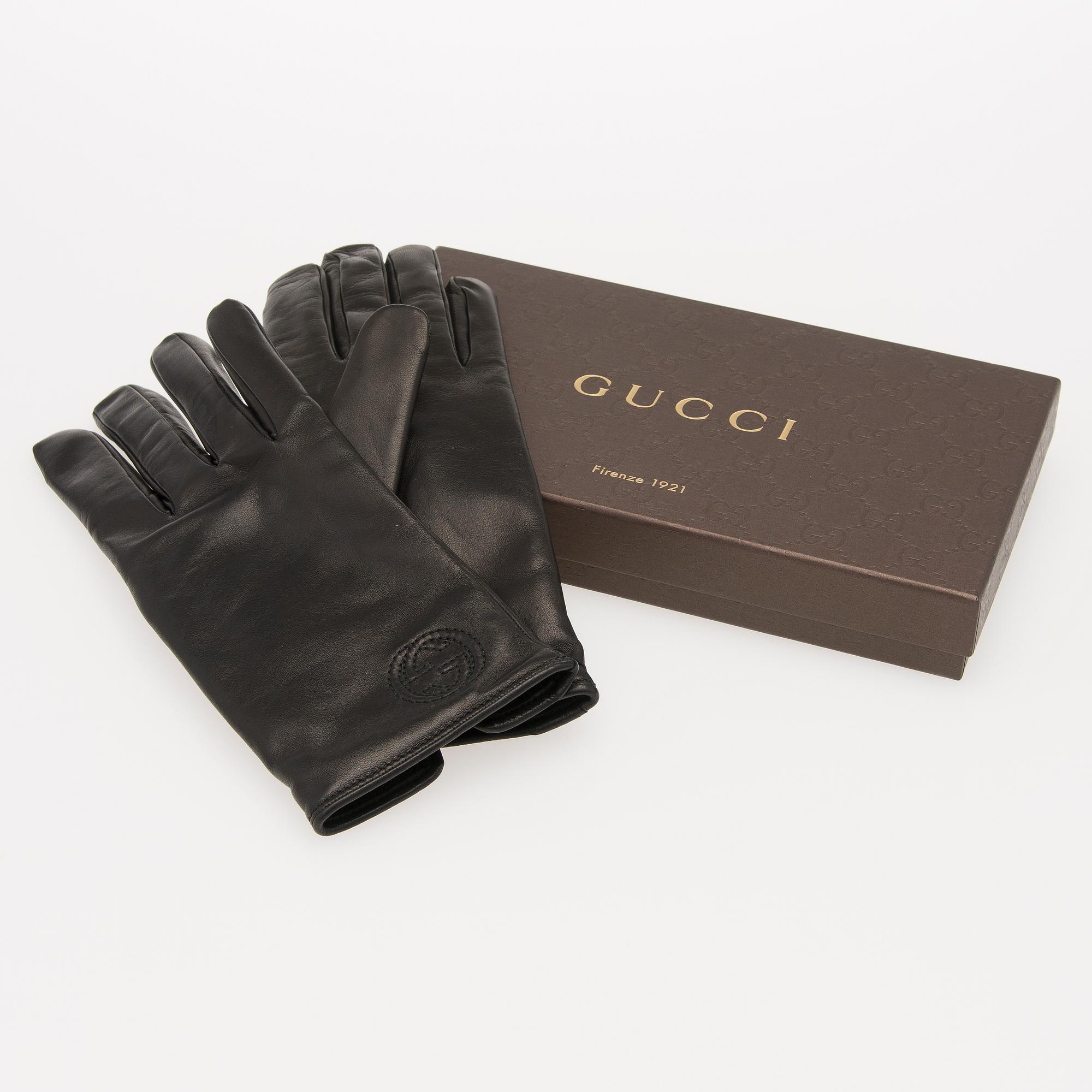 A pair of Gucci ladies' leather gloves.