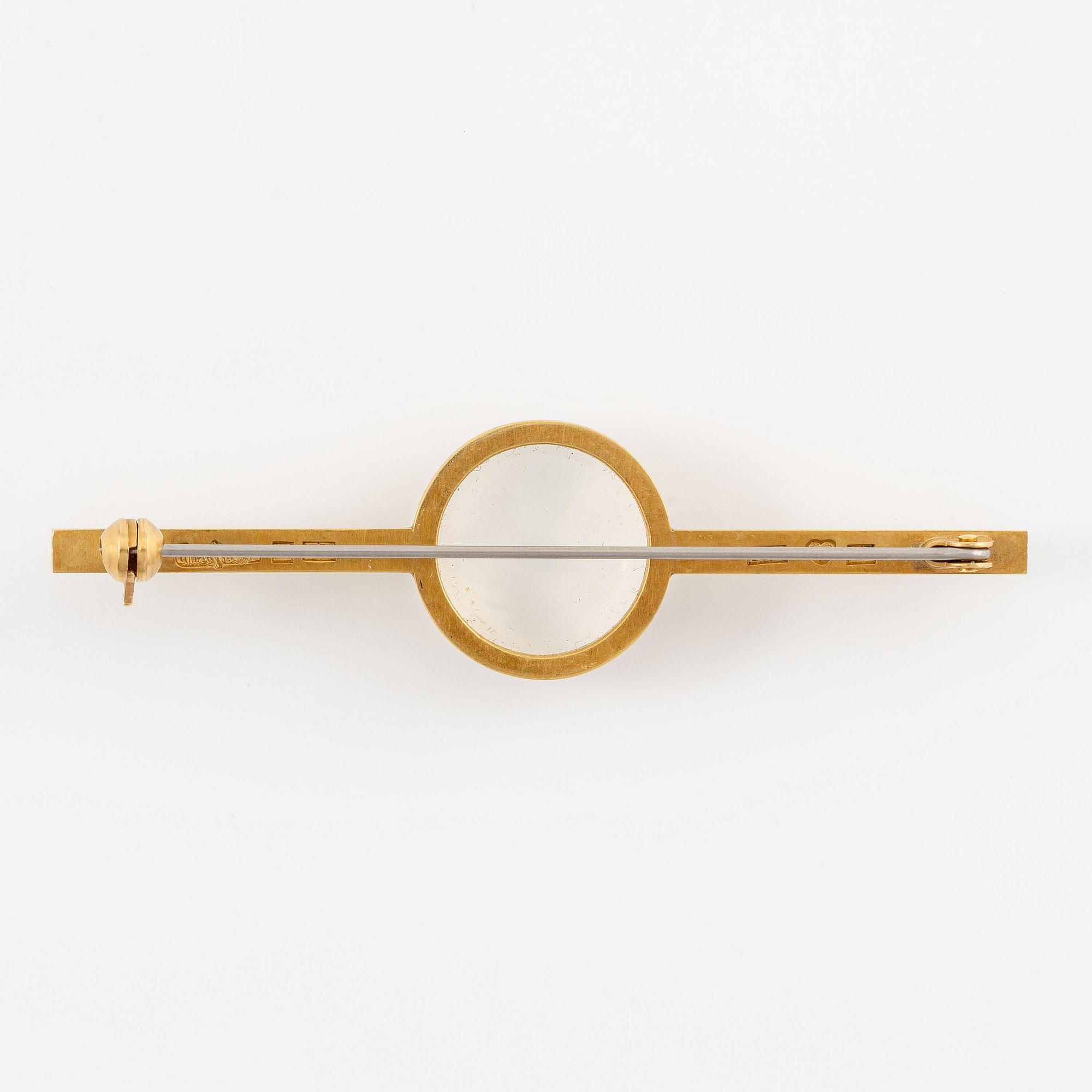 Wiwen Nilsson, a brooch, 18K gold with a cabochon-cut moonstone, Lund 1967.