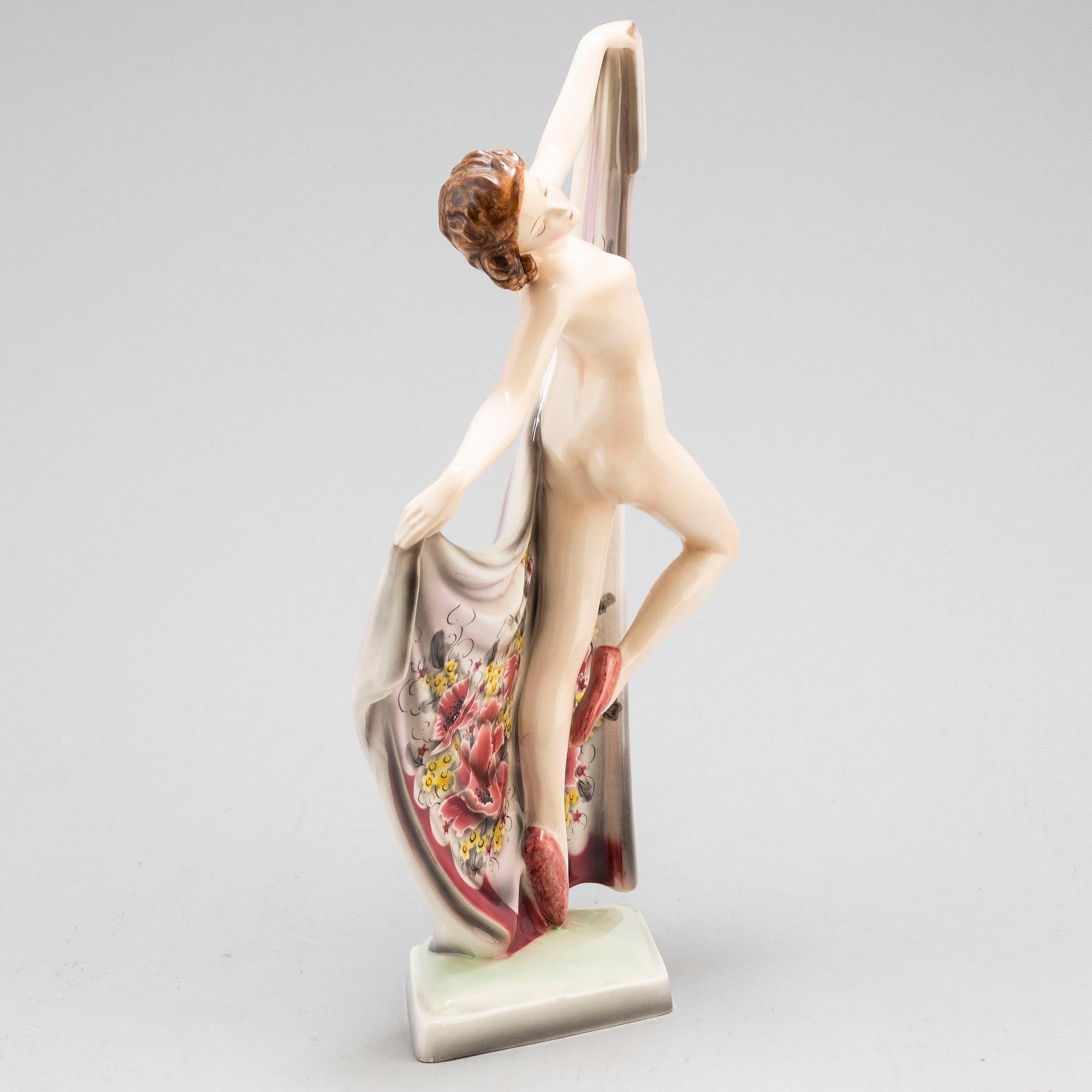 A porcelain figurine by Goldscheider, Vienna.