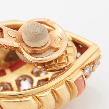 A pair of 18K gold Boucheron earrings set with round brilliant-cut diamonds and coral.