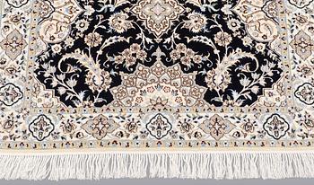A Nain runner carpet, part silk Sk 6LAA, 337 x 103 cm.