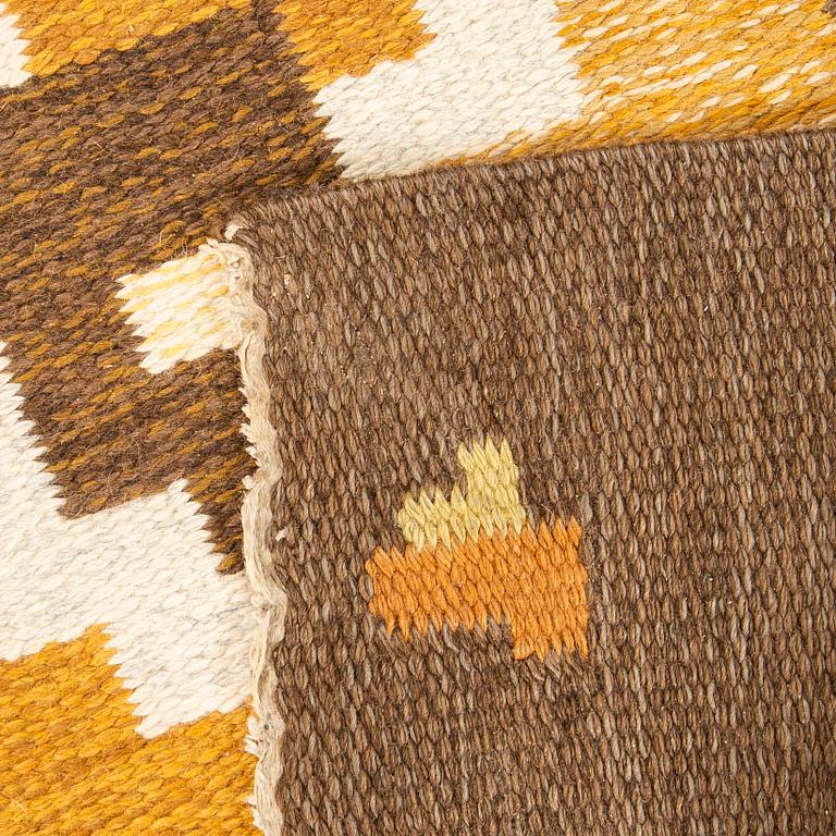 A flat weave carpet signed Erik Lundberg ca 240 x 170 cm.