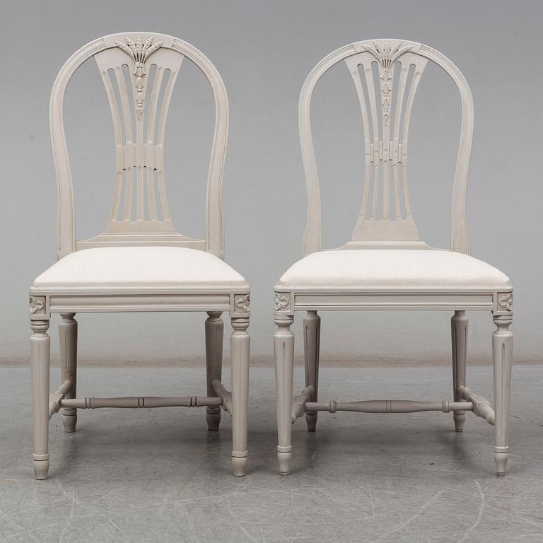 a set of 4+4 gustavian style chairs from the second half of the 20th century.