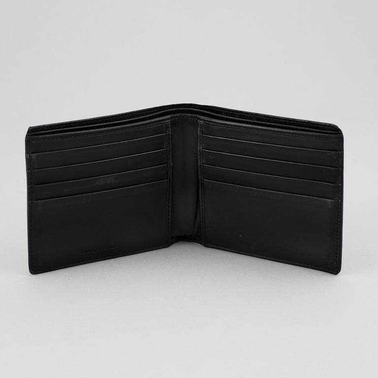 Bottega veneta, a black leather wallet.