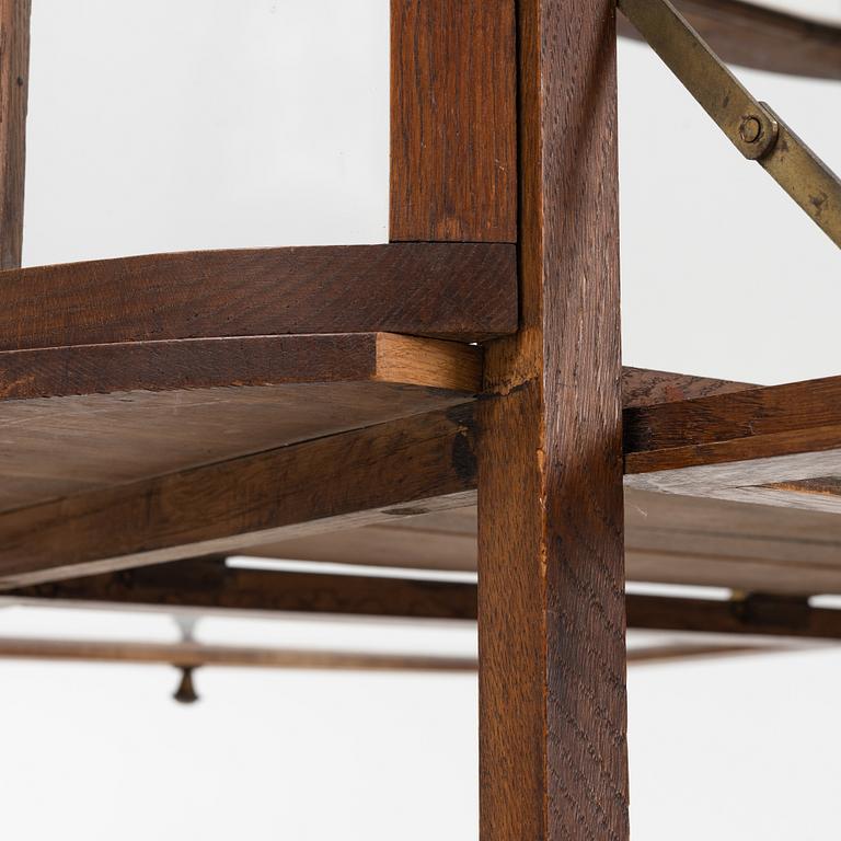 An oak tea trolley, early 20th Century.