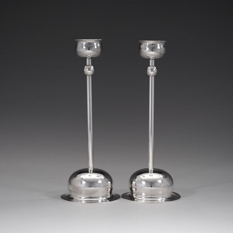 A pair of Birger Haglund sterling candlesticks, Stockholm 1968.