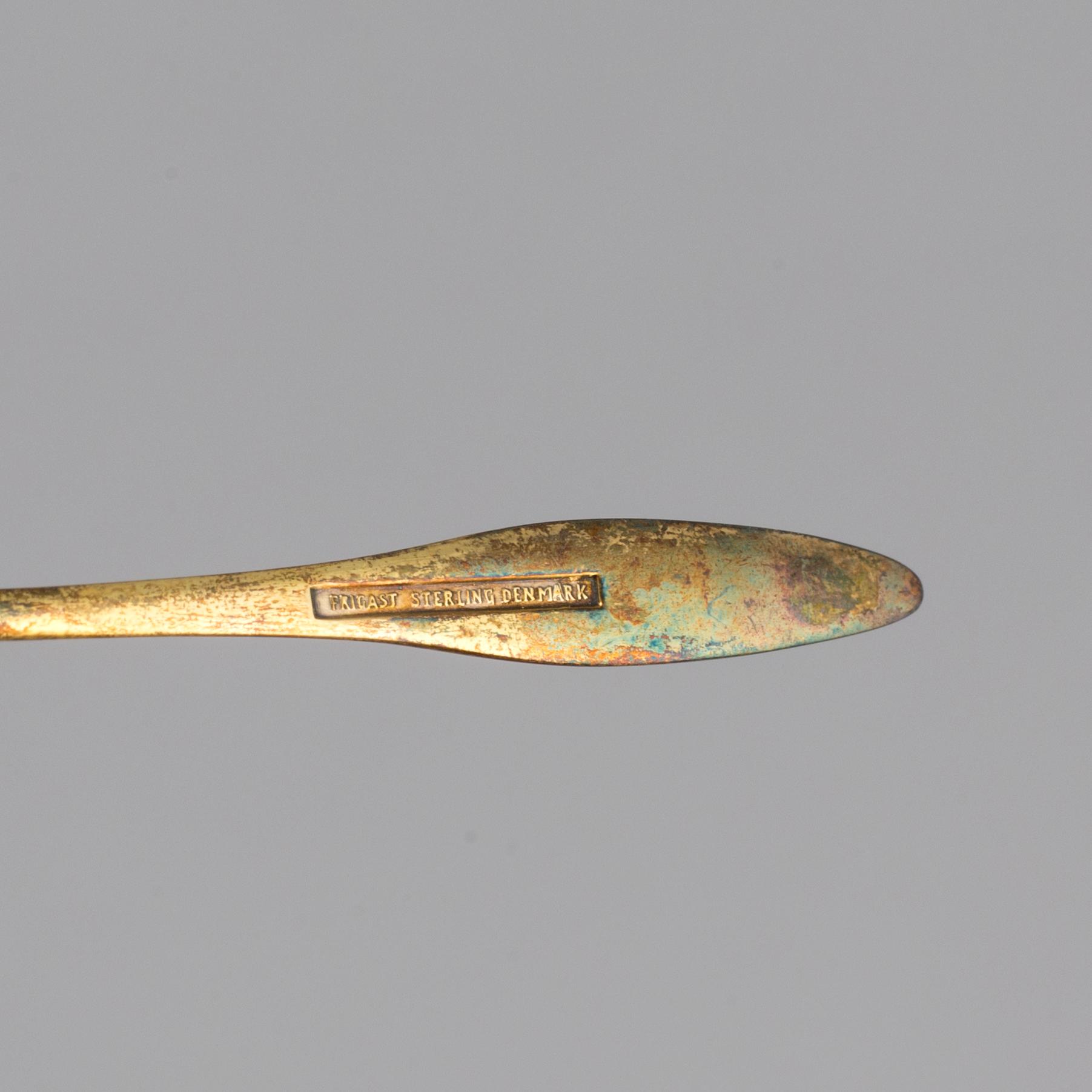 a set of 12 stirling spoons by Frigast, Denmark, 20th century.