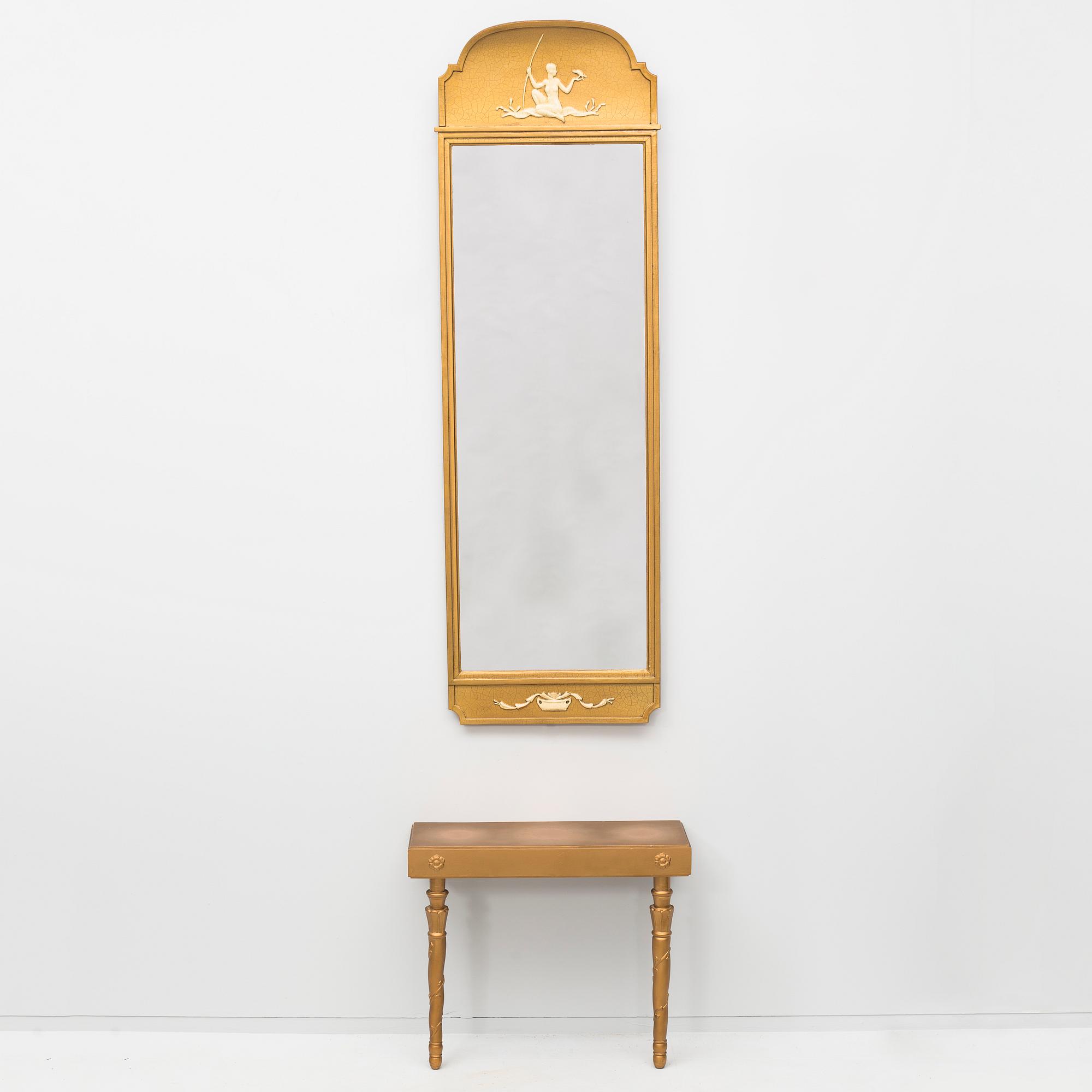 A mirror with table, first half of the 20th century.