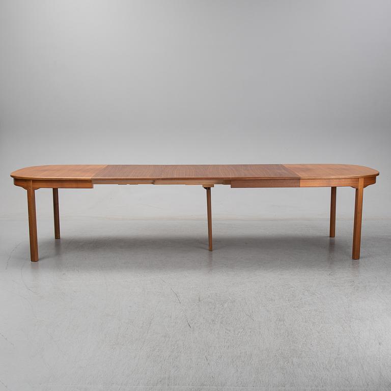 Carl Malmsten, A five-piece walnut 'Ambassadör' dining suite by Carl Malmsten.