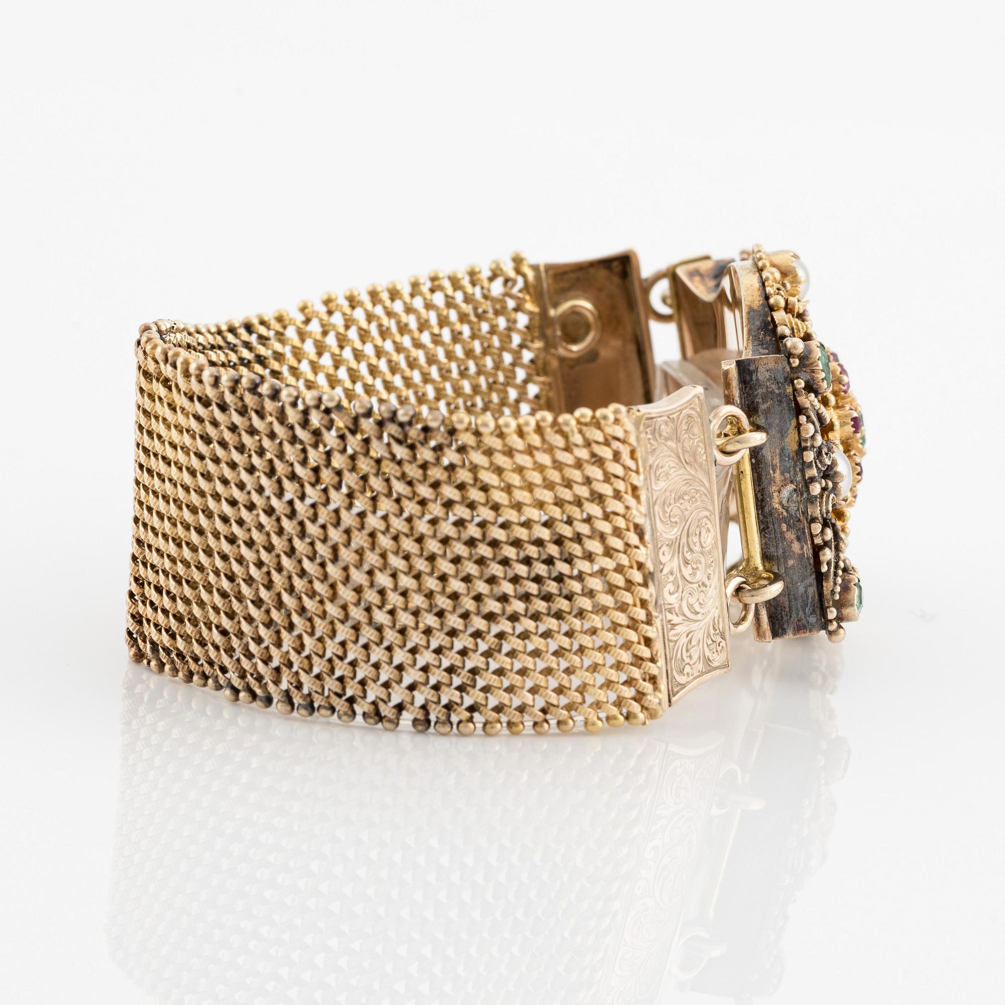 Gold bracelet with pearls, emeralds, and rubies, two loose links included.
