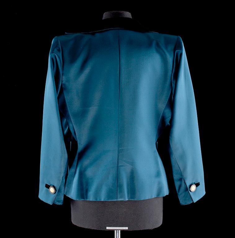 A darkgreen silk and black velvet jacket by Yves Saint Laurent.