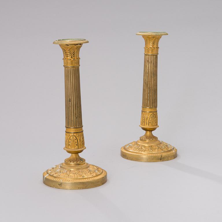 A PAIR OF FRENCH ORMOLU CANDLESTICKS, 19th century.