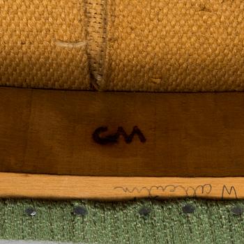A "Lata Greven" armchair by Carl Malmsten.