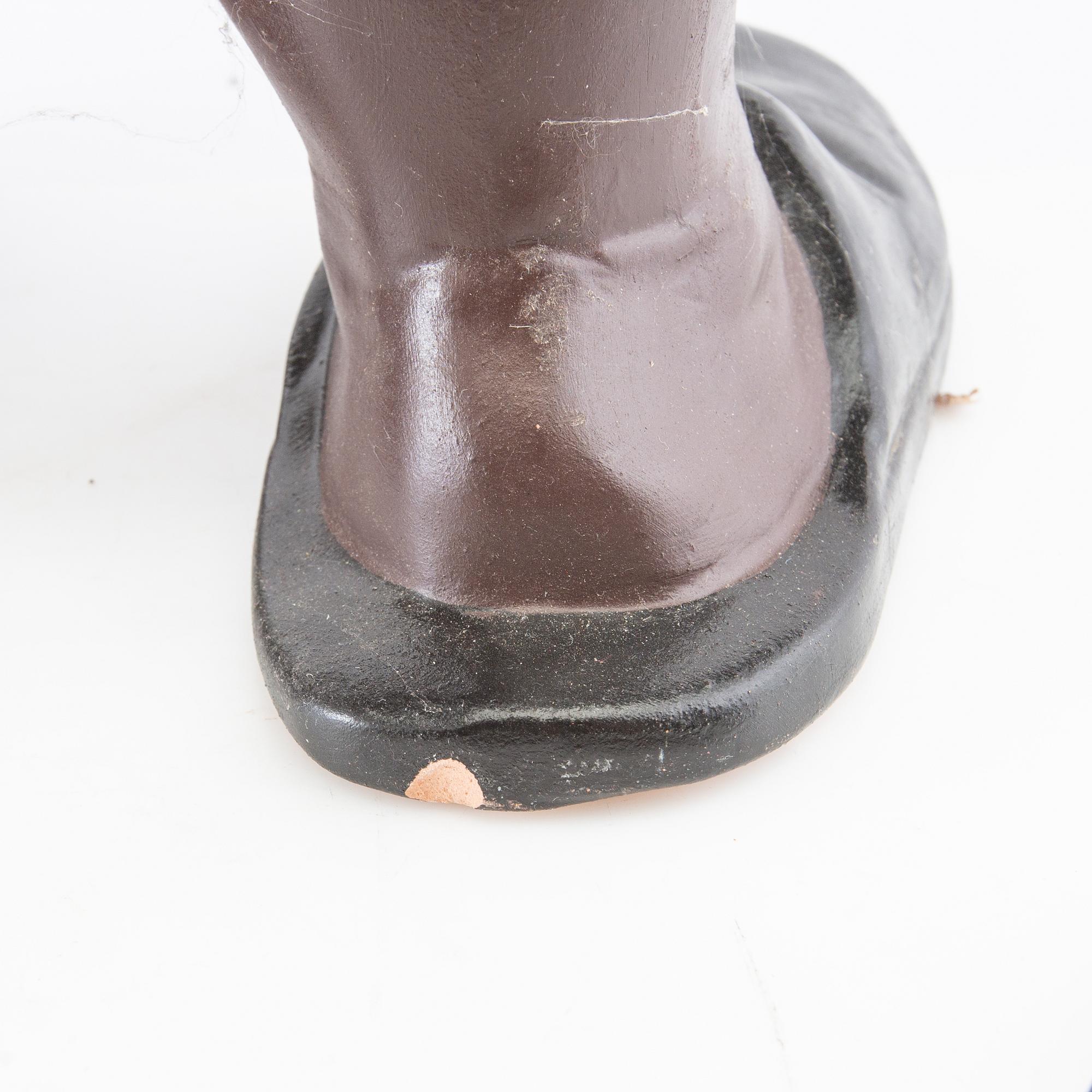 Gnome with lantern Heissner Germany second half of the 20th century painted terracotta.