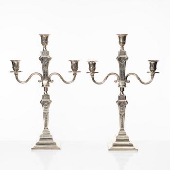 A pair of Louis XVI style sterling silver candelabra,Lale Silverware & Co Ltd, Istanbul, Turkey, 20th century.