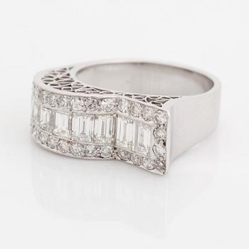 An 18K white gold ring set with baguette- and eight-cut diamonds.