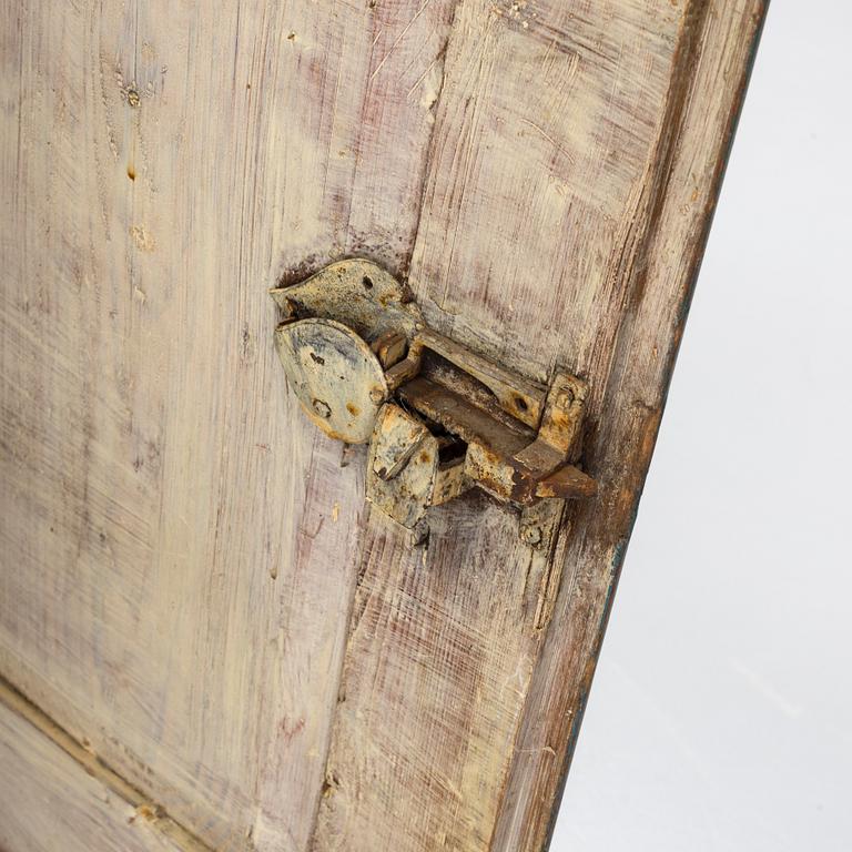 a wooden wall-cabinet marked 1814 and 1836.