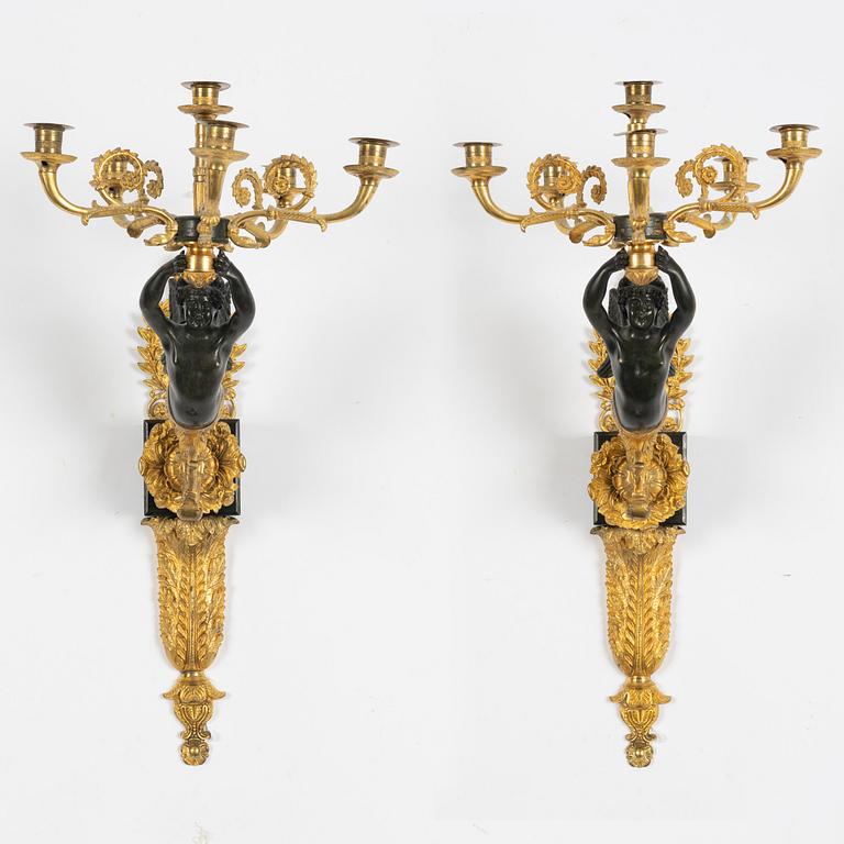 A pair of Empire style appliques, circa 1900.