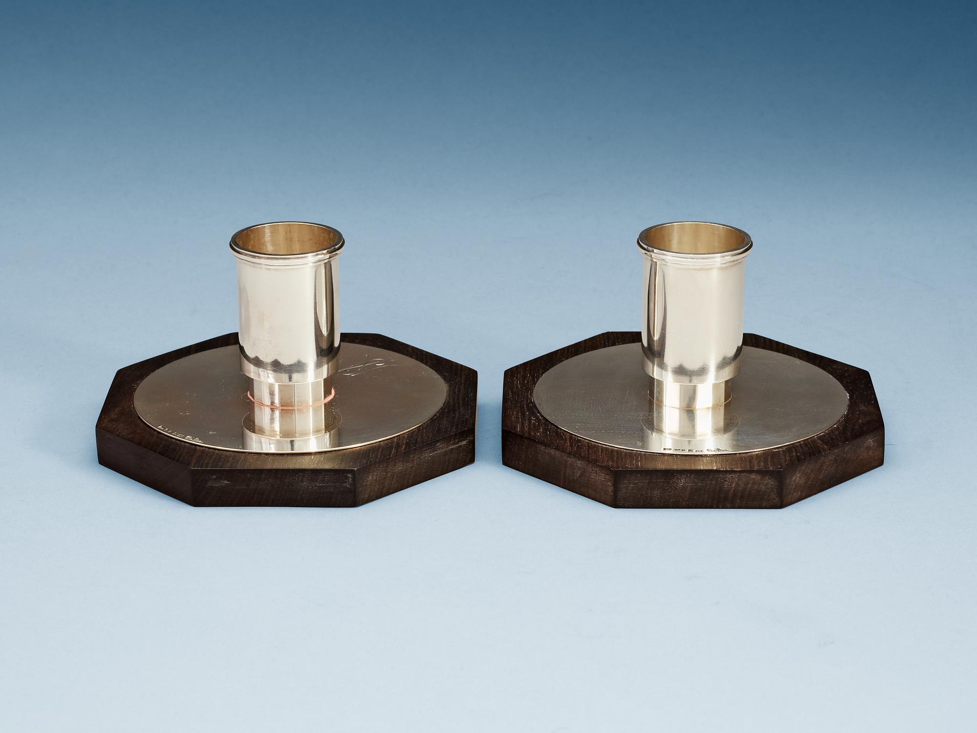 A pair of Wiwen Nilsson sterling and ebony candle sticks, Lund 1937.