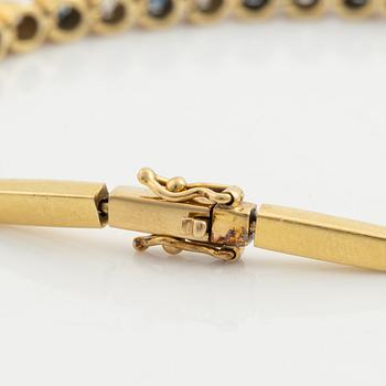 Bracelet, gold with sapphires and brilliant-cut diamonds.