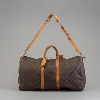 A Keepall Bandouliere 55 WEEKEND BAG by Louis Vuitton.