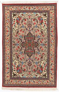 A Ghom rug, c. 160 x 105 cm.